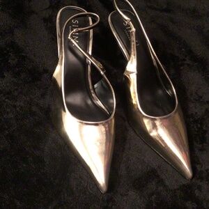 Golden sling back heels